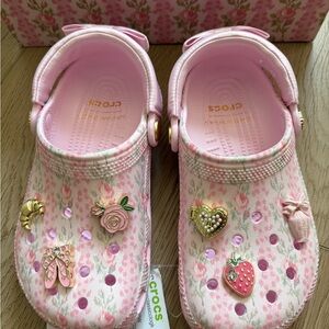 CROCS Pink Floral Kids Clogs with Gold Charm Details